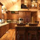 Rustic Home, alder wood,bar stool,cabinet covered appliances,rustic style kitchen