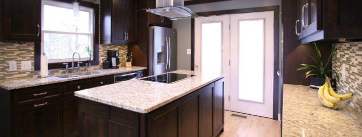 flat surface cooktop,stainless hood,contemporary kitchen,custom cabinets