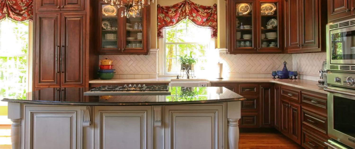 kitchen,island,glass cabinet doors,decorative details,two toned cabinets,ideas