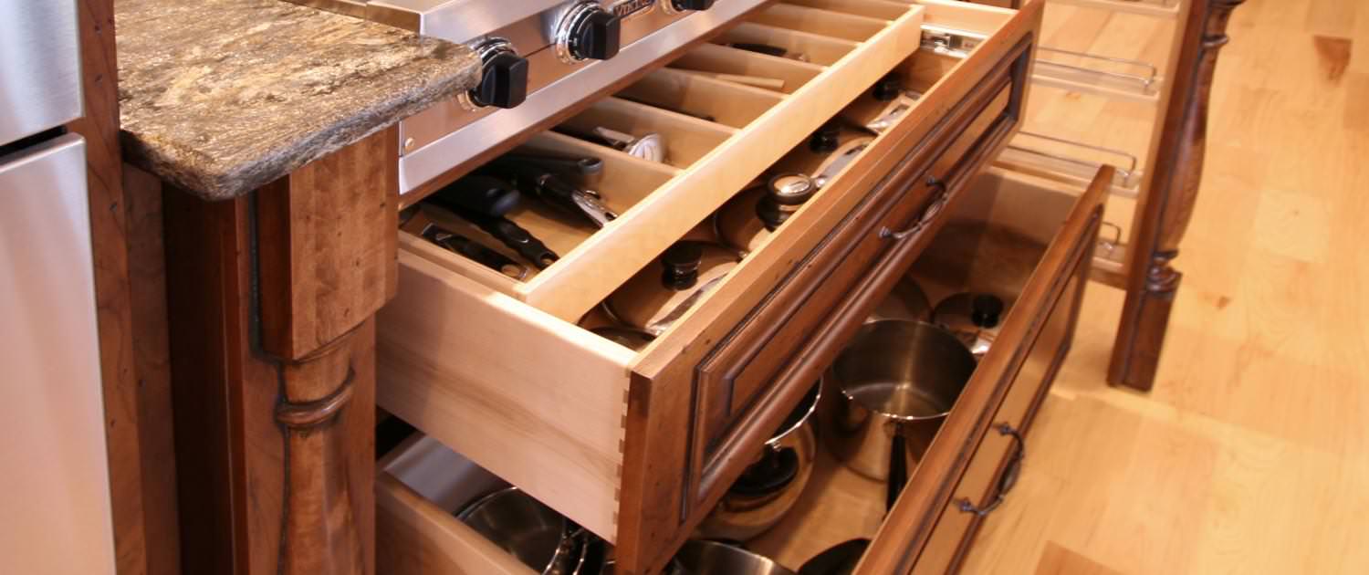 storage ideas,utensil storage,pull out drawers,decorative post,spice rack