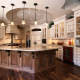 kitchen,island,glass cabinet doors,decorative details,two toned cabinets,ideas