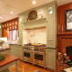 kitchen,decorative details,double oven,painted cabinets,pot filler
