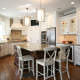 kitchen,island,decorative details,two toned cabinets,transitional style,ideas