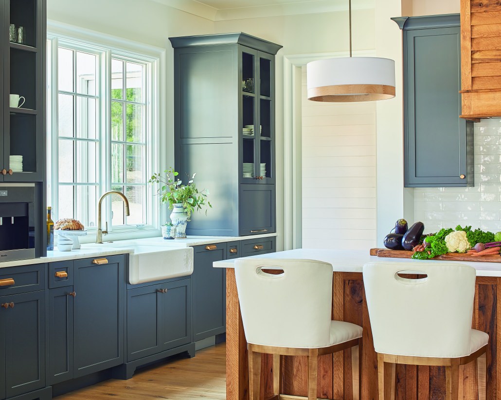 modern farmhouse kitchen cabinets, apron sink, reclaimed wood kitchen island, white stools, brass hardware