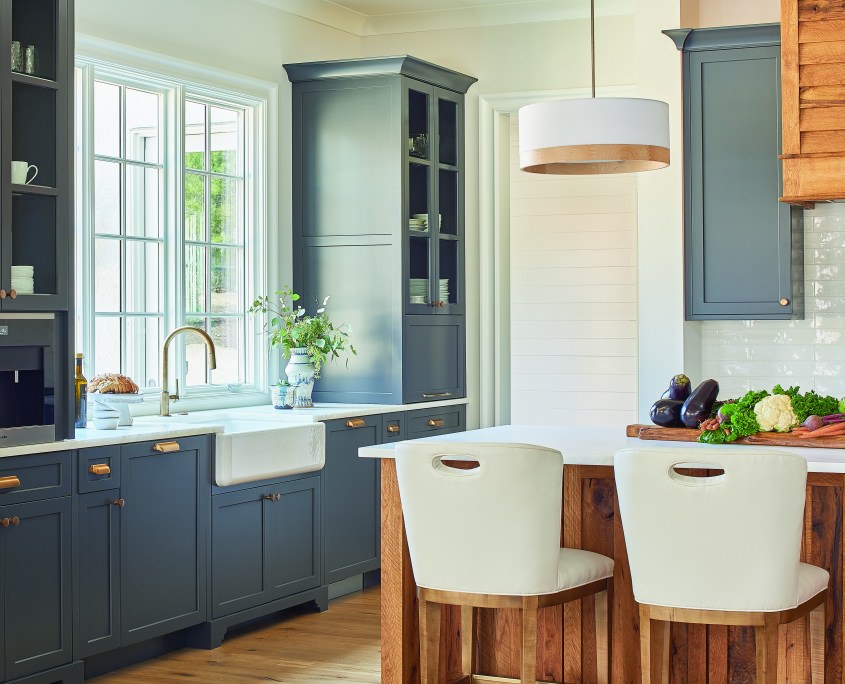 modern farmhouse kitchen cabinets, apron sink, reclaimed wood kitchen island, white stools, brass hardware