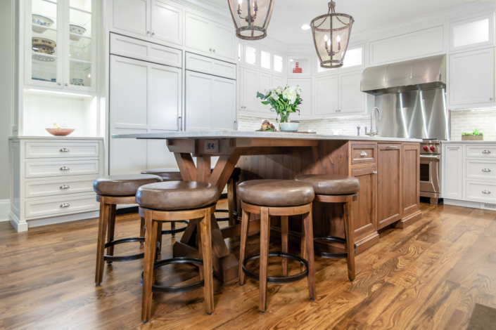 large brown island with stools