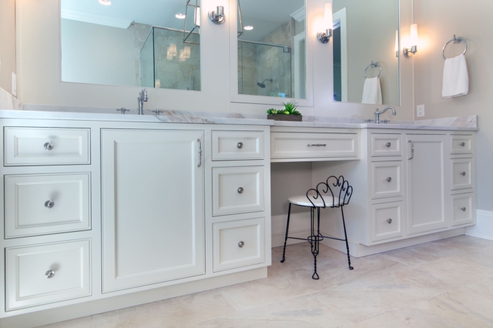 bathroom vanity with a stool