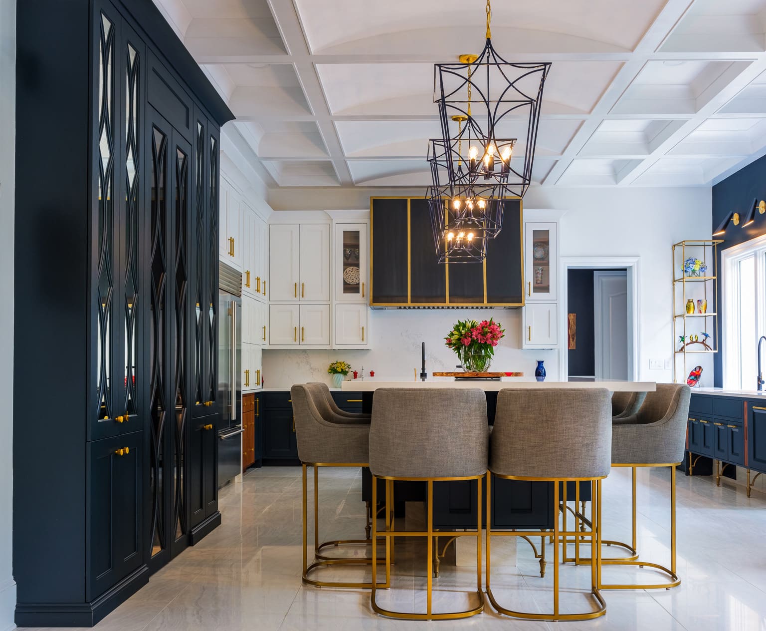 Custom blue and white kitchen cabinets with island seating