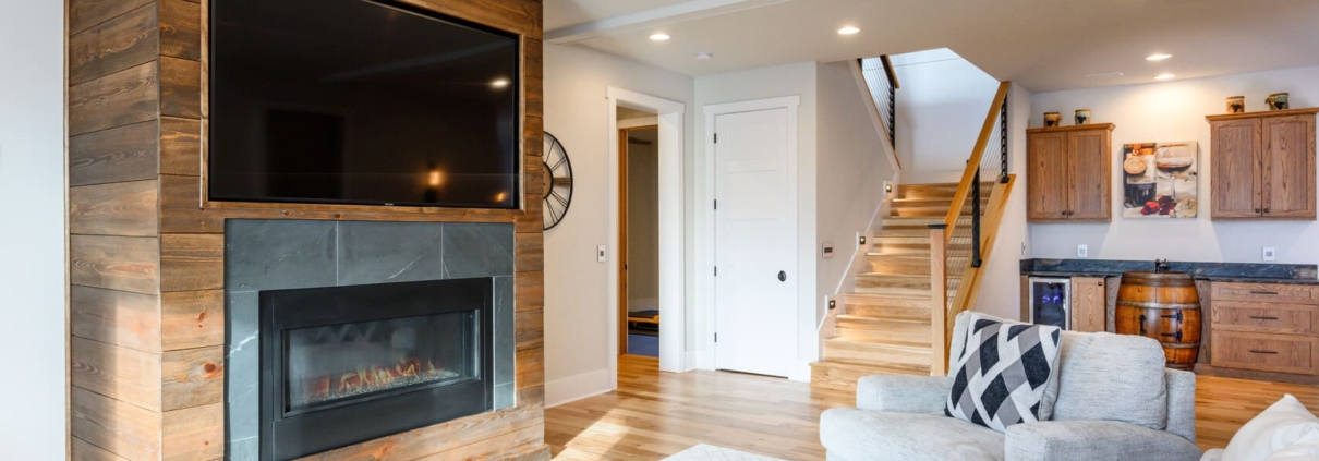 entertainment center with a fireplace and living room