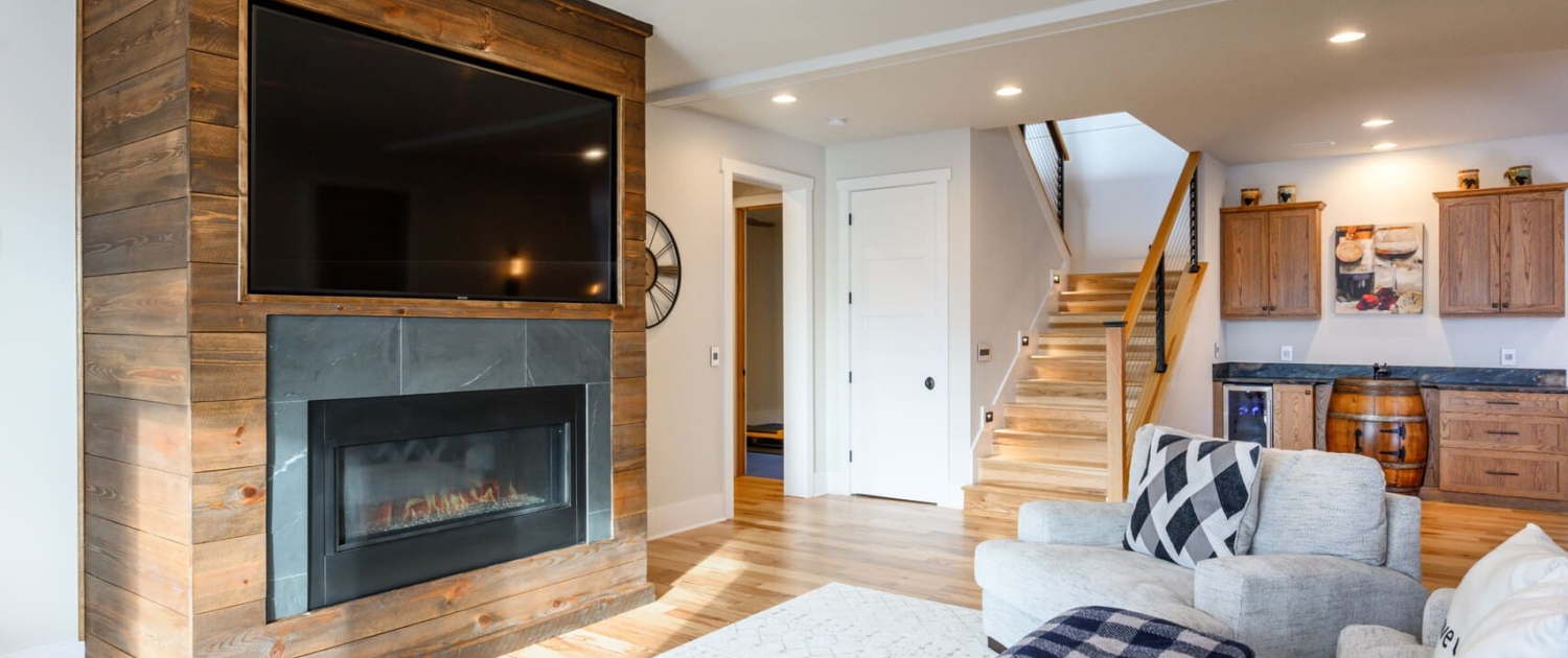 entertainment center with a fireplace and living room