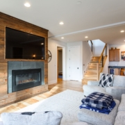 entertainment center with a fireplace and living room