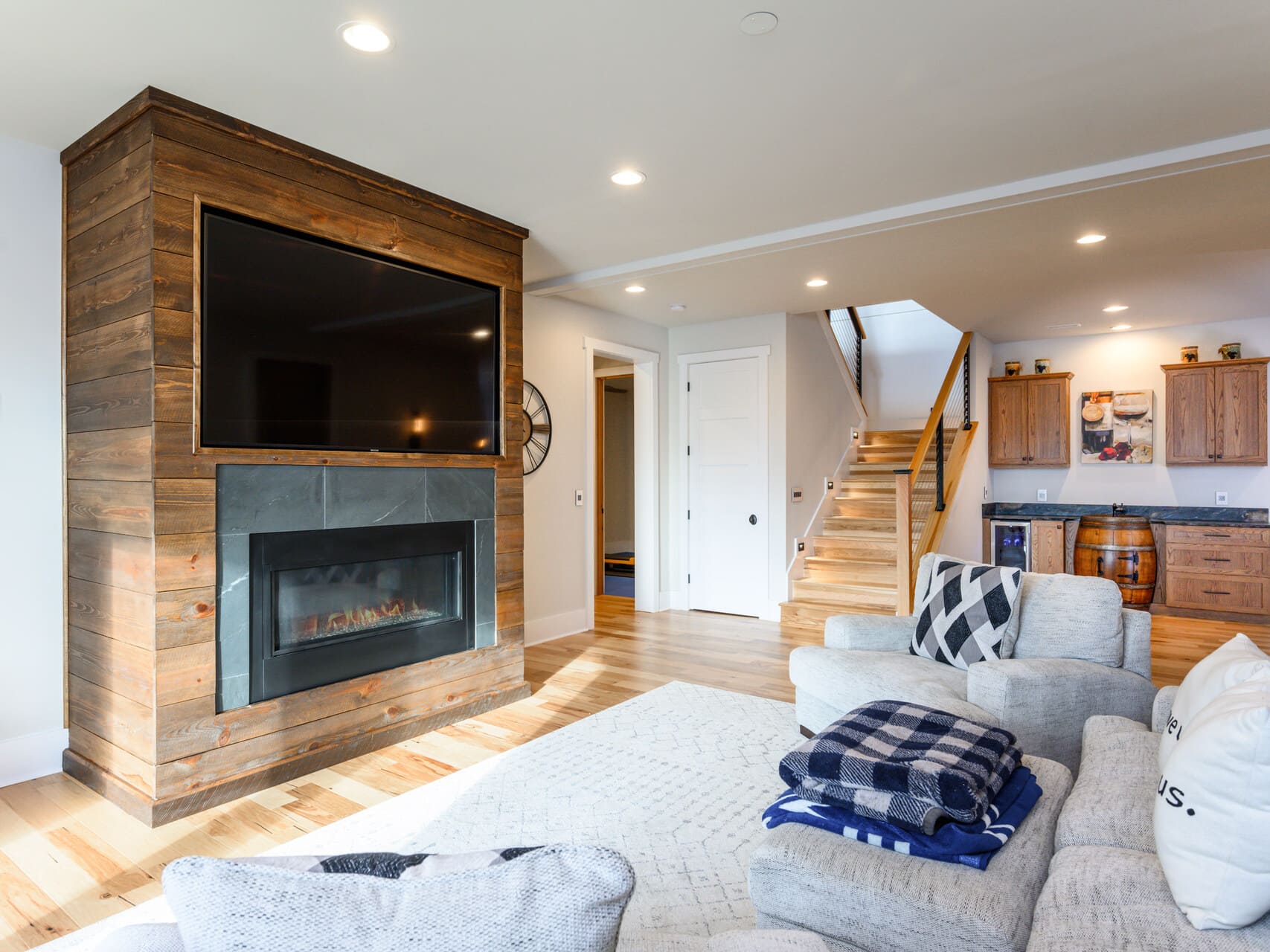 entertainment center with a fireplace and living room