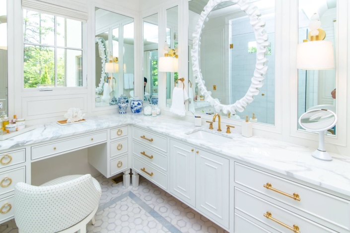 white bathroom vanity with large mirrors