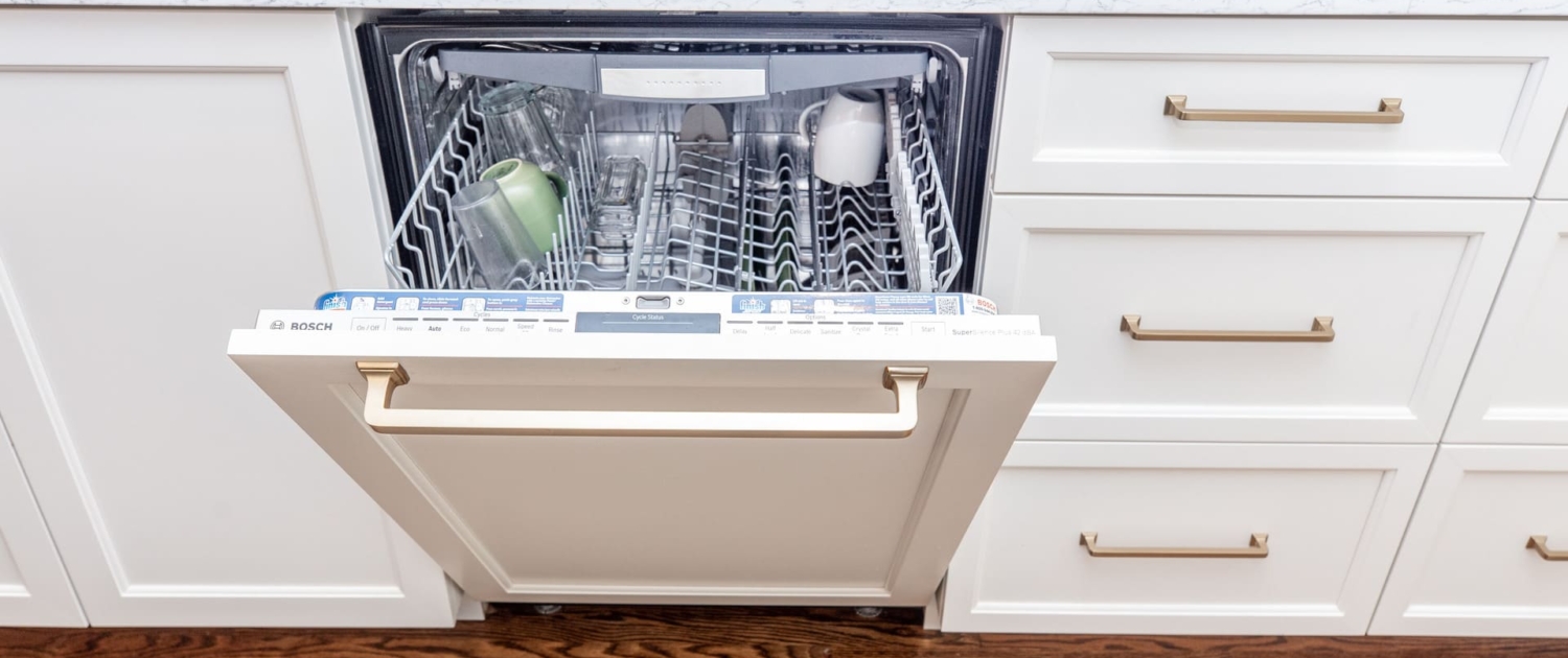 paneled dishwasher with gold hardware