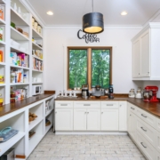 walk in pantry with a coffee bar