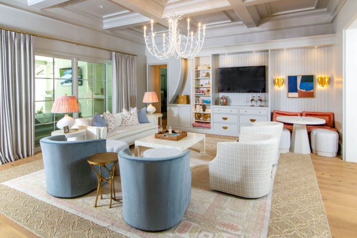 family room with chandelier