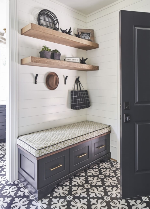 black bench in an entryway