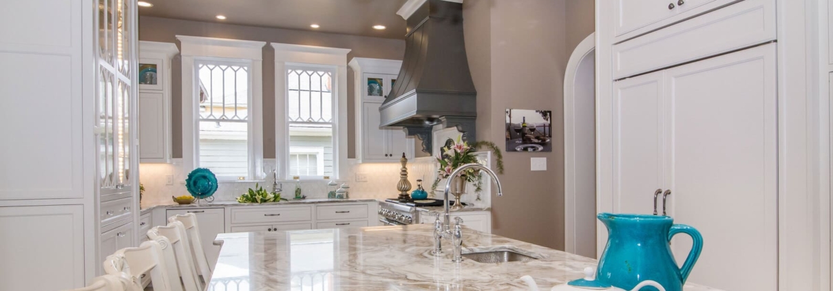 kitchen with a chandelier and panel appliances