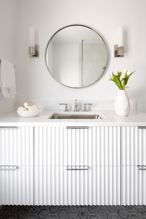 white bathroom vanity with a copper sink