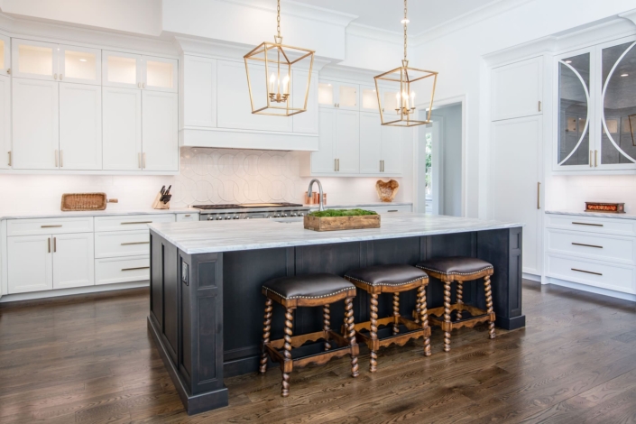 white and black kitchen with glass doors