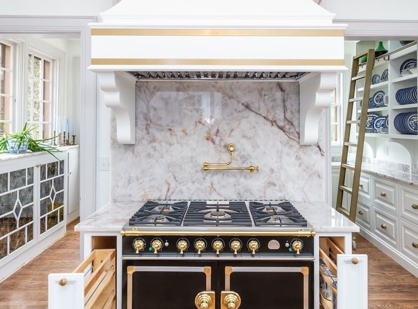 range with marble backsplash