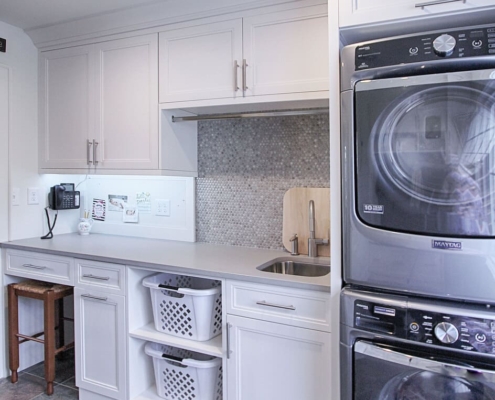 white laundry room with washer and dryer