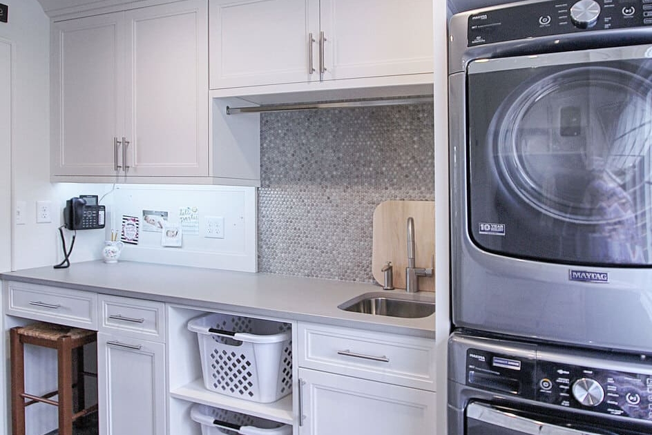 white laundry room with washer and dryer