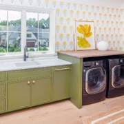 laundry room with flower wallpaper
