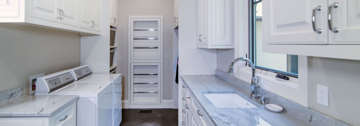 laundry room with a utility sink