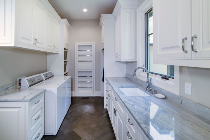 laundry room with a utility sink