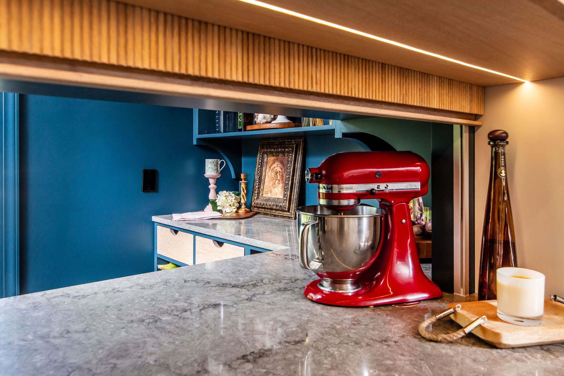 Mixer storage in a pantry with a sliding door