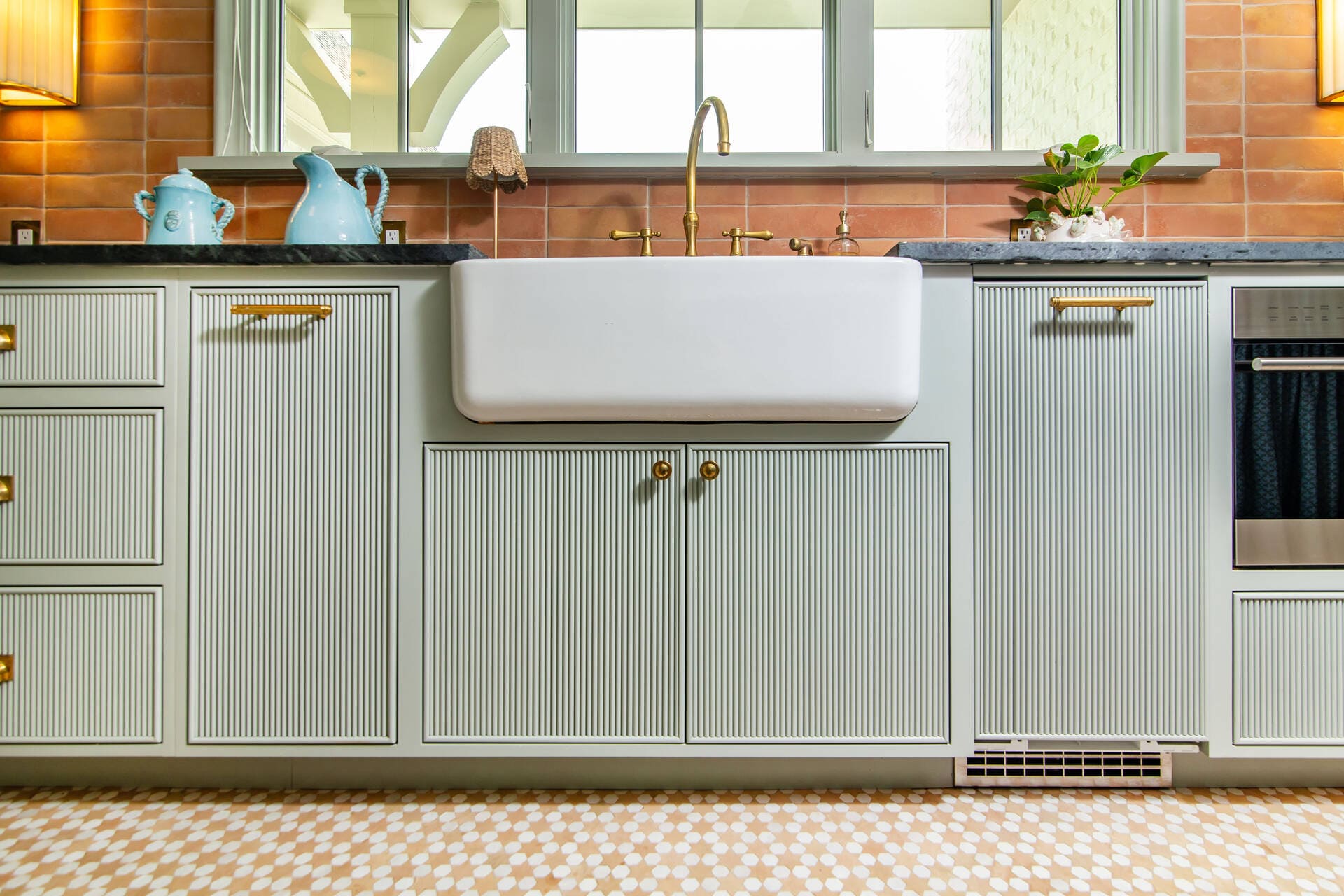 reeded scullery cabinets and sink
