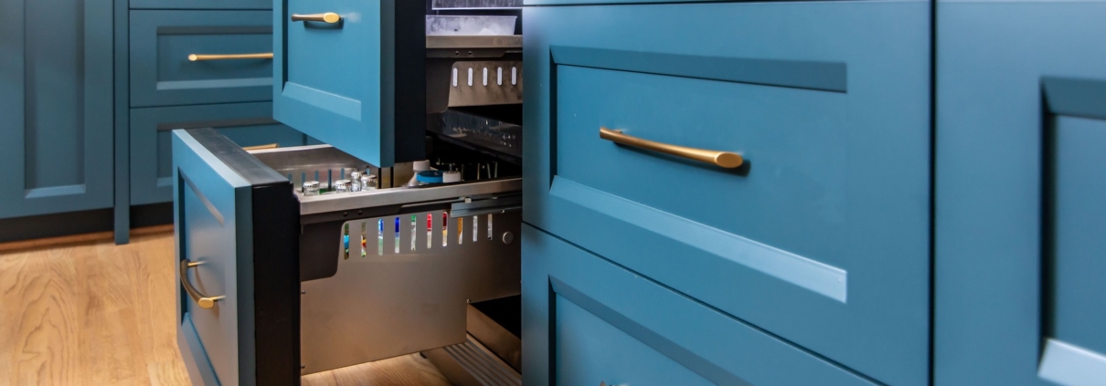Blue kitchen cabinets with fridge drawers