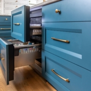 Blue kitchen cabinets with fridge drawers