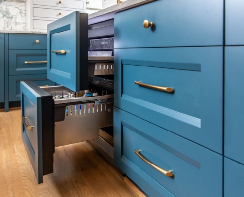 Blue kitchen cabinets with fridge drawers