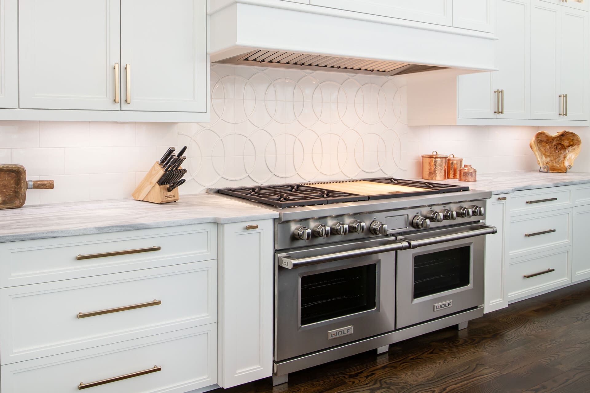 white kitchen with cabinet lighting