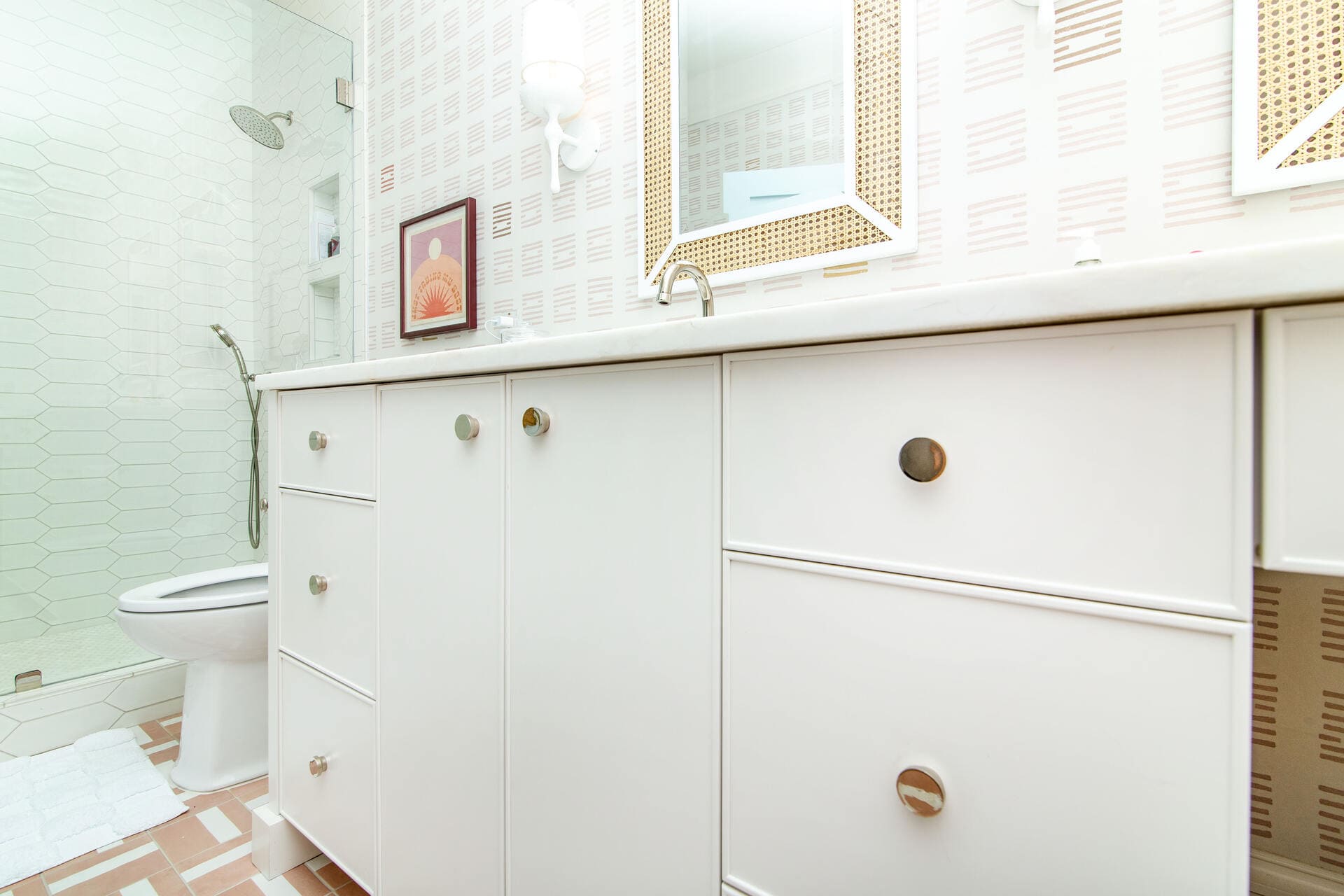white bathroom vanity and shower