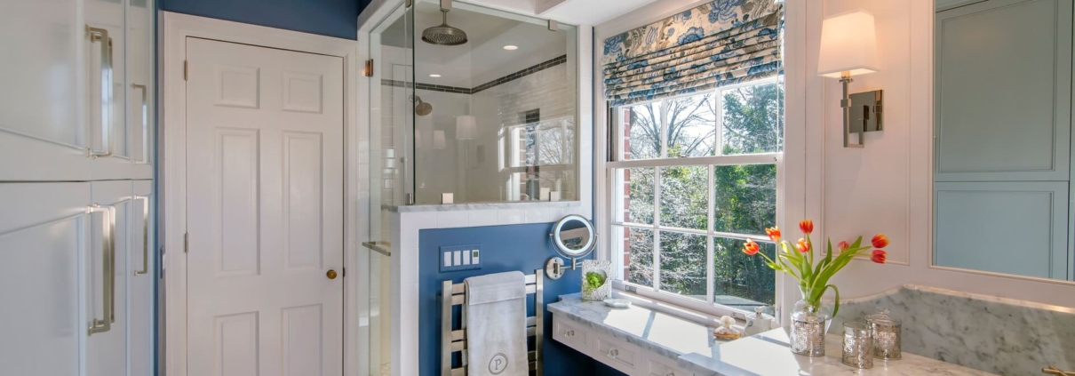 bathroom with a big window and shower