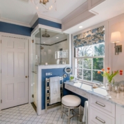 bathroom with a big window and shower