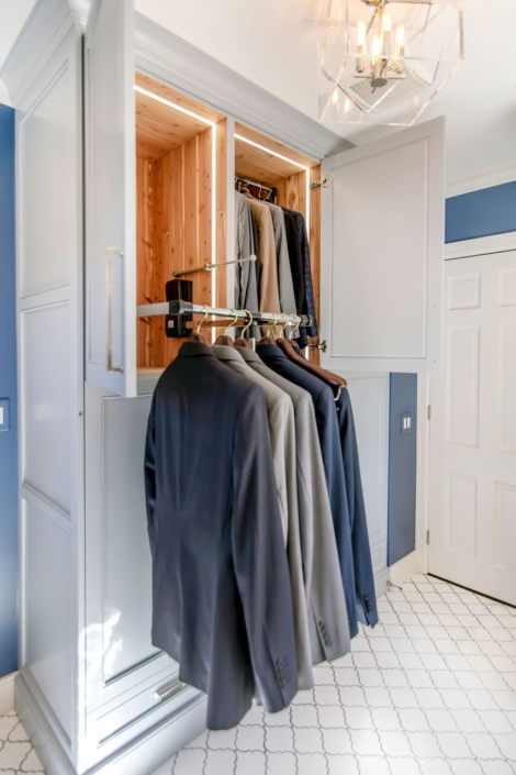 closet storage with lighting in a bathroom