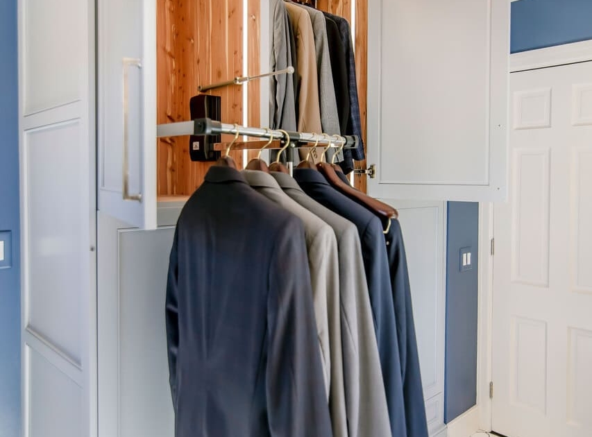closet storage with lighting in a bathroom