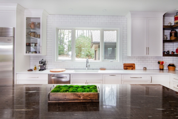 white kitchen with big windows