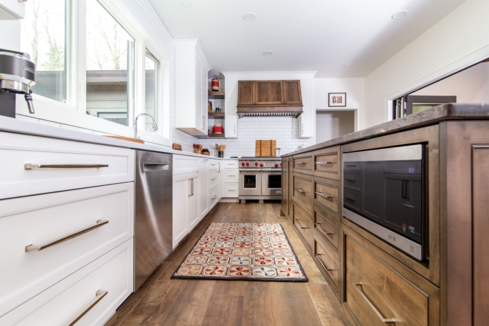 brown island in a white kitchen