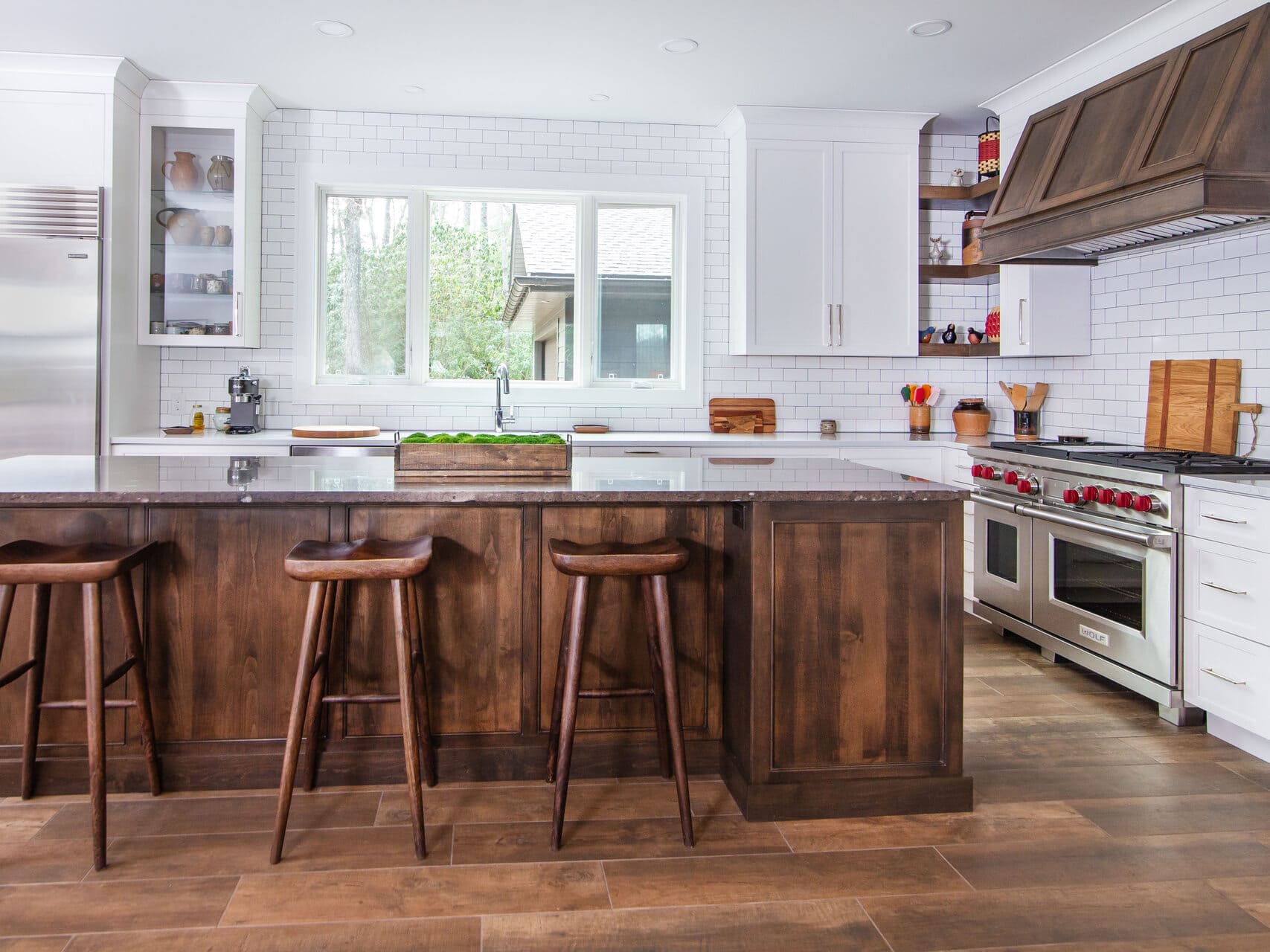 white kitchen with barstools