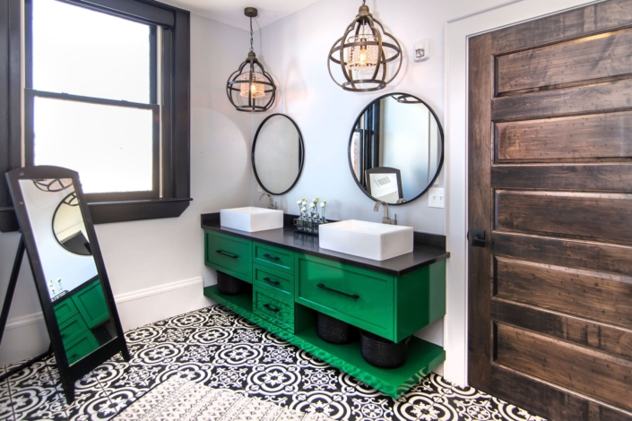 green bathroom with tile floors