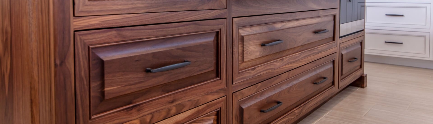 walnut island with a stovetop