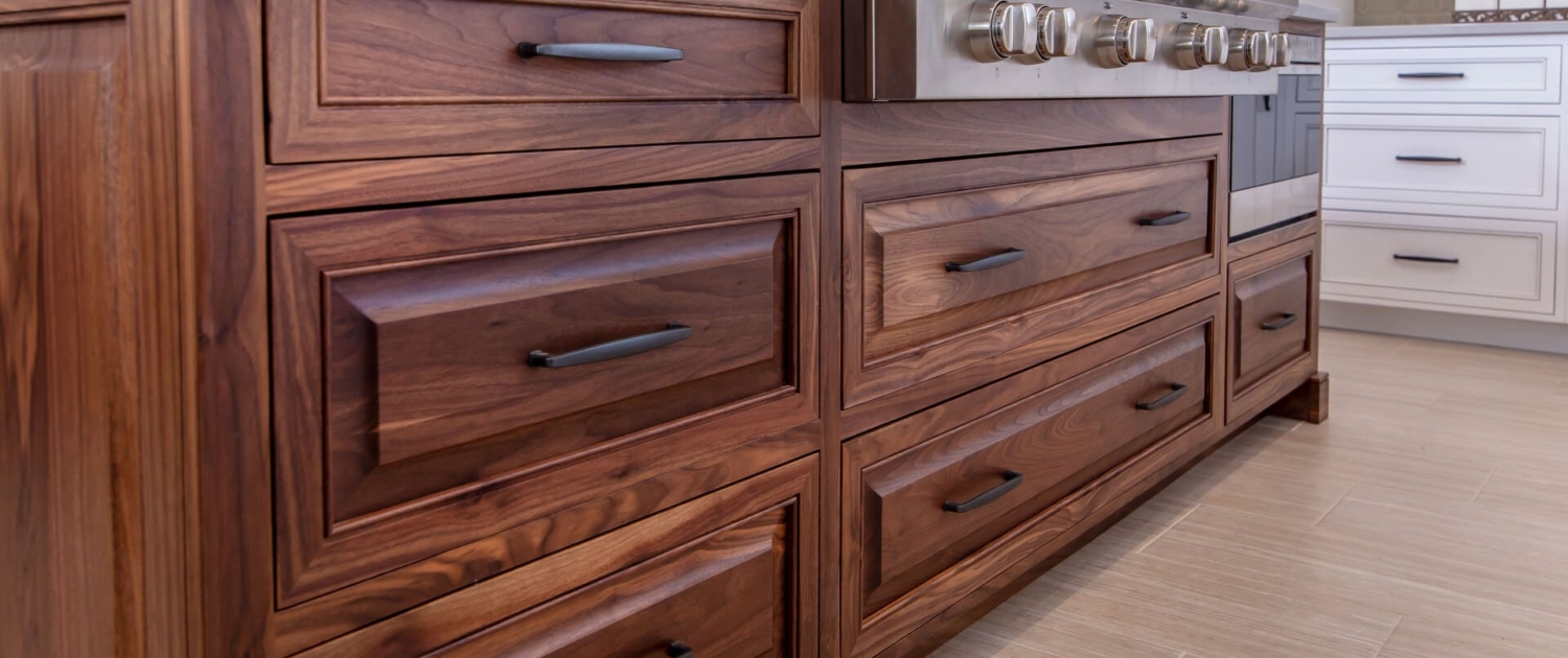 walnut island with a stovetop