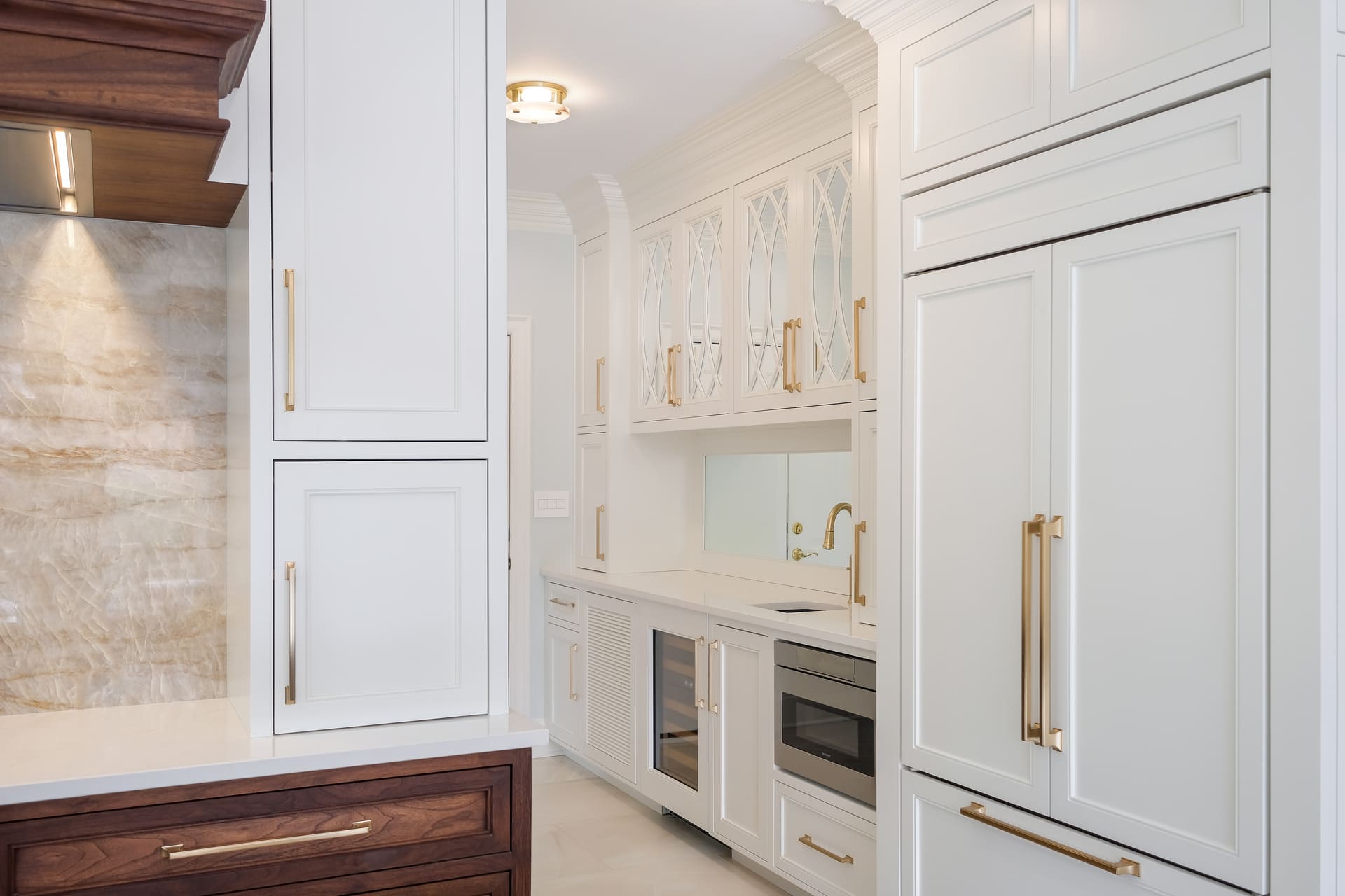 White kitchen cabinets with glass doors
