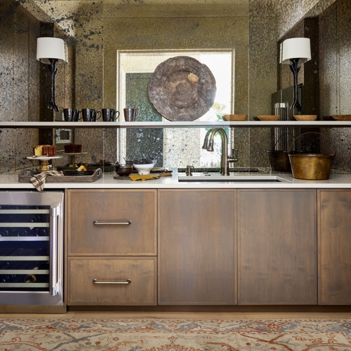 beverage center with a sink