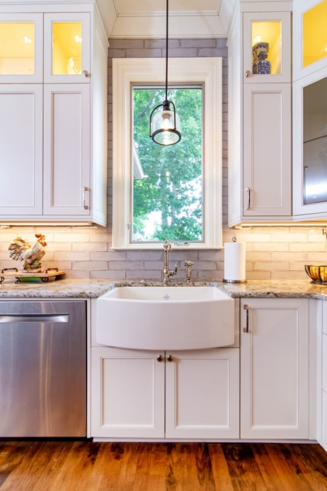 kitchen sink with a light and window